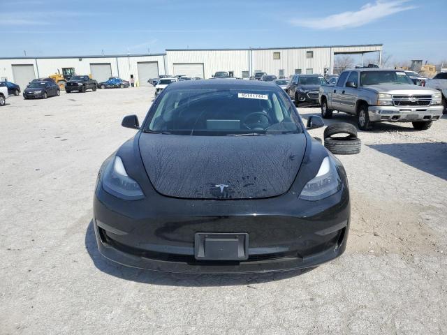 Photo 5 from auction – 2021 TESLA MODEL 3 with VIN 5YJ3E1EA7MF090342