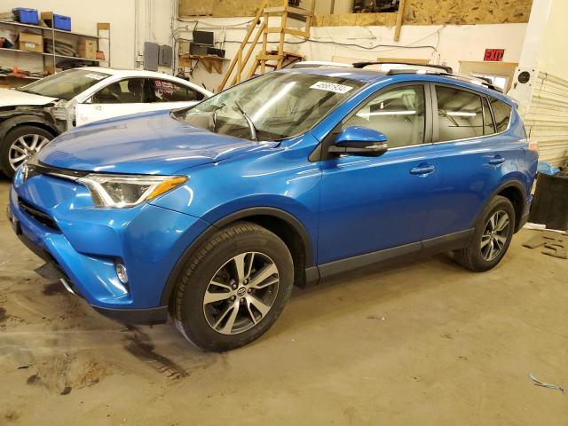 TOYOTA RAV4 XLE 2016 with VIN 2T3RFREV9GW477031 - Photo from auction