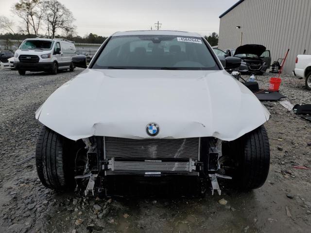 Photo 5 from auction – 2021 BMW 330I with VIN 3MW5R1J08M8B99873