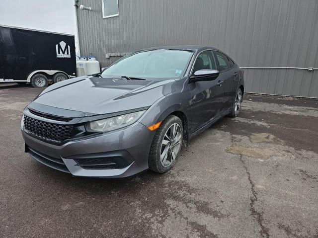 Photo 2 from auction – 2017 HONDA CIVIC LX with VIN 2HGFC2F55HH033911
