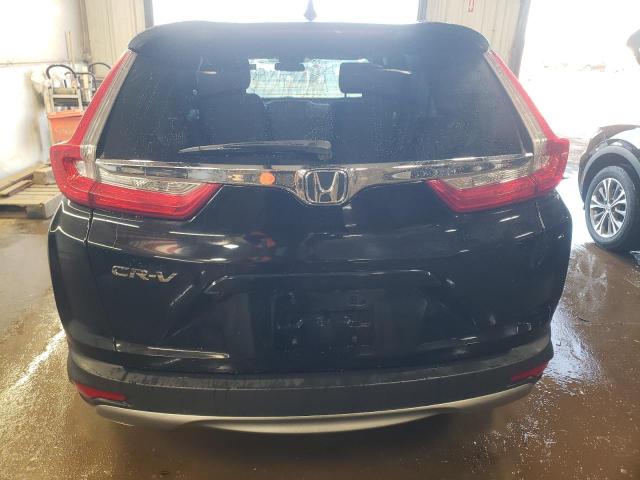 Photo 6 from auction – 2017 HONDA CR-V LX with VIN 7FARW5H34HE005091