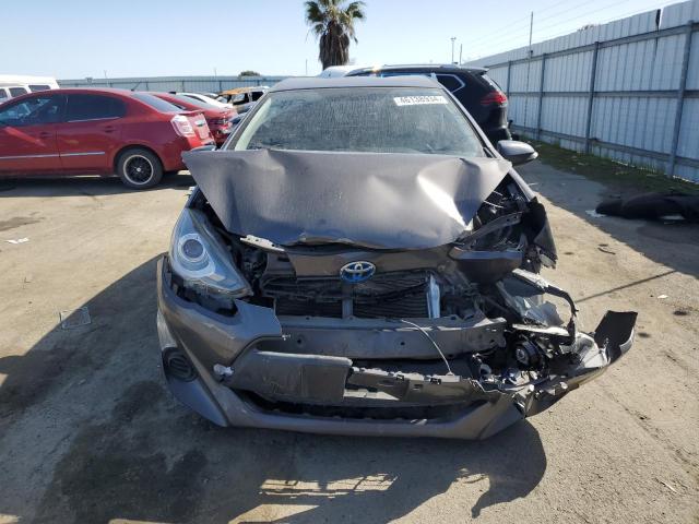 Photo 5 from auction – 2015 TOYOTA PRIUS C with VIN JTDKDTB39F1580325