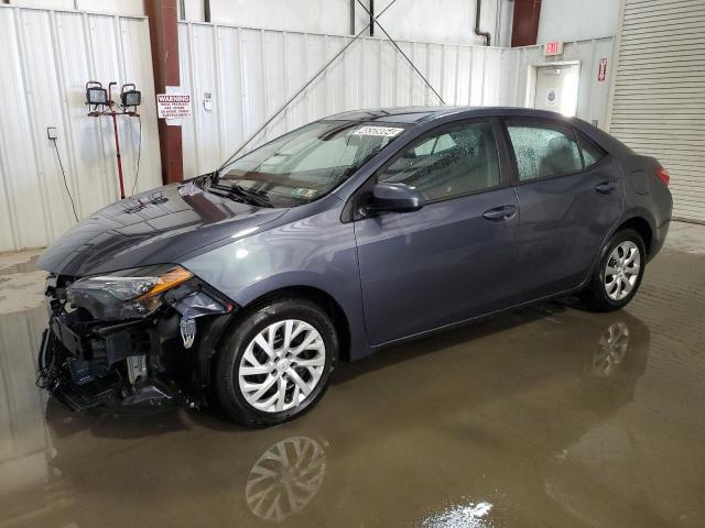 TOYOTA COROLLA L 2019 with VIN 5YFBURHE7KP940256 - Photo from auction