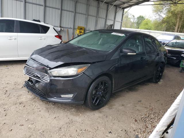 FORD FOCUS SE 2015 with VIN 1FADP3F21FL313689 - Photo from auction