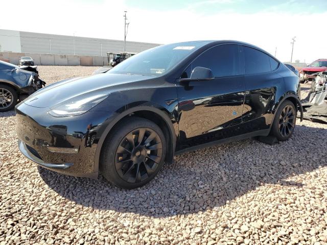 TESLA MODEL Y 2023 with VIN 7SAYGAEE2PF749860 - Photo from auction