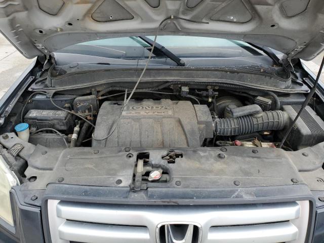 Photo 12 from auction – 2006 HONDA PILOT LX with VIN 2HKYF18106H512406