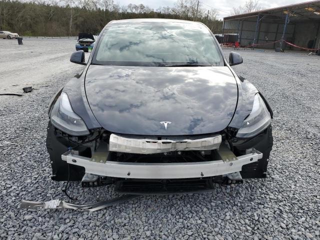 Photo 5 from auction – 2023 TESLA MODEL Y with VIN 7SAYGDEF4PF977305