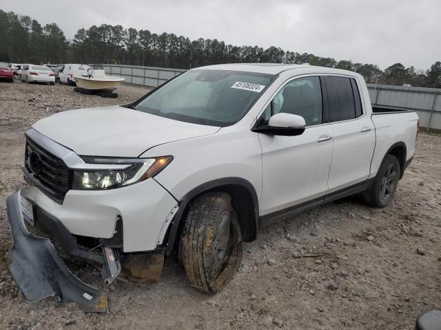 HONDA RIDGELINE 2023 with VIN 5FPYK3F70PB066599 - Photo from auction