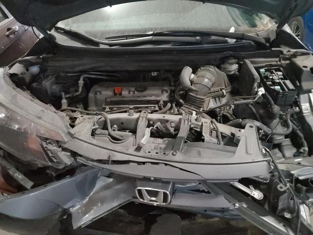 Photo 11 from auction – 2014 HONDA CR-V LX with VIN 2HKRM4H3XEH726928