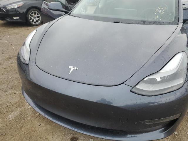 Photo 11 from auction – 2021 TESLA MODEL 3 with VIN 5YJ3E1EA9MF084686