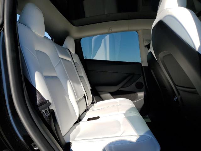 Photo 11 from auction – 2023 TESLA MODEL Y with VIN 7SAYGAEE5PF980509