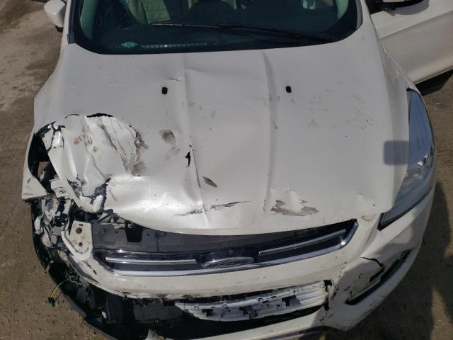 Photo 11 from auction – 2016 FORD ESCAPE TIT with VIN 1FMCU9J99GUB98918