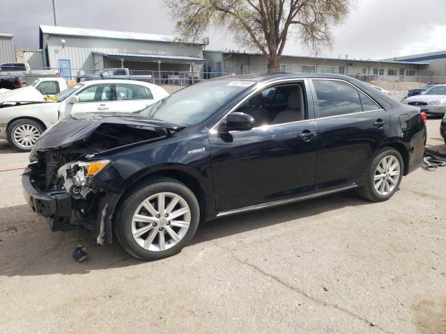 TOYOTA CAMRY HYBR 2014 with VIN 4T1BD1FK8EU136738 - Photo from auction