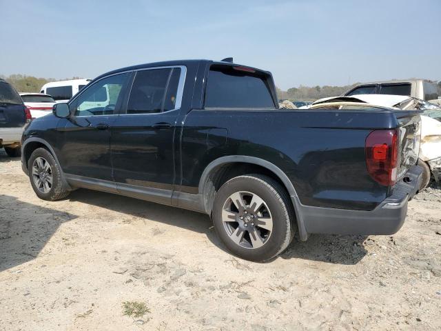 Photo 2 from auction – 2017 HONDA RIDGELINE with VIN 5FPYK2F59HB009117
