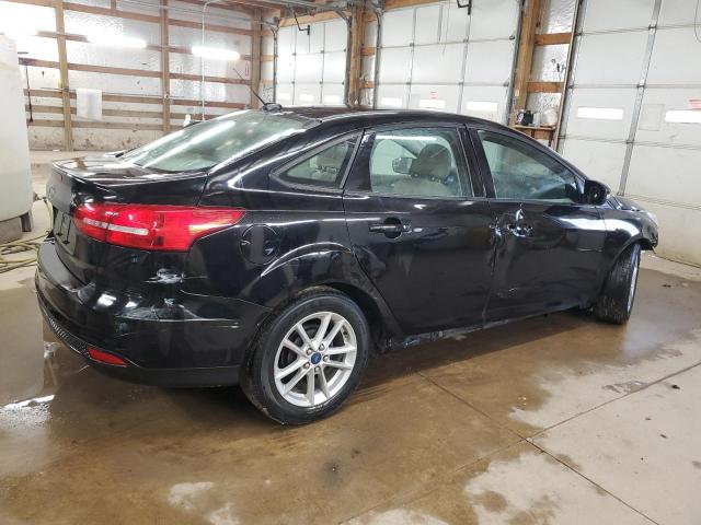 Photo 3 from auction – 2016 FORD FOCUS SE with VIN 1FADP3F21GL224755