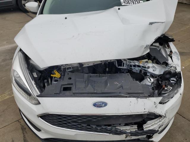 Photo 11 from auction – 2015 FORD FOCUS SE with VIN 1FADP3K20FL375896