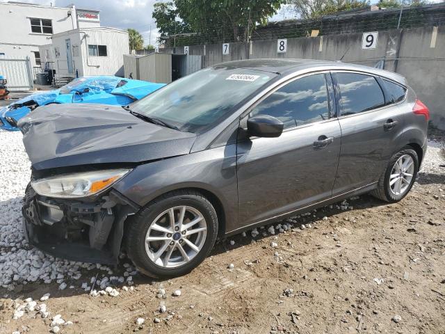 FORD FOCUS SE 2018 with VIN 1FADP3K28JL299725 - Photo from auction