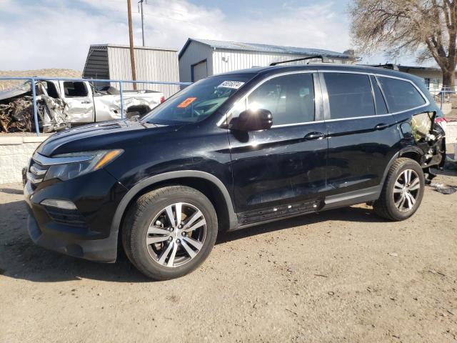HONDA PILOT EX 2017 with VIN 5FNYF5H3XHB017897 - Photo from auction