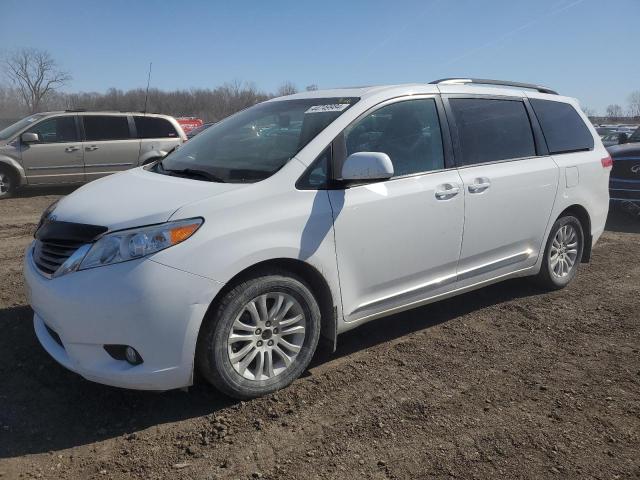 Photo 1 from auction – 2014 TOYOTA SIENNA XLE with VIN 5TDYK3DC7ES420975