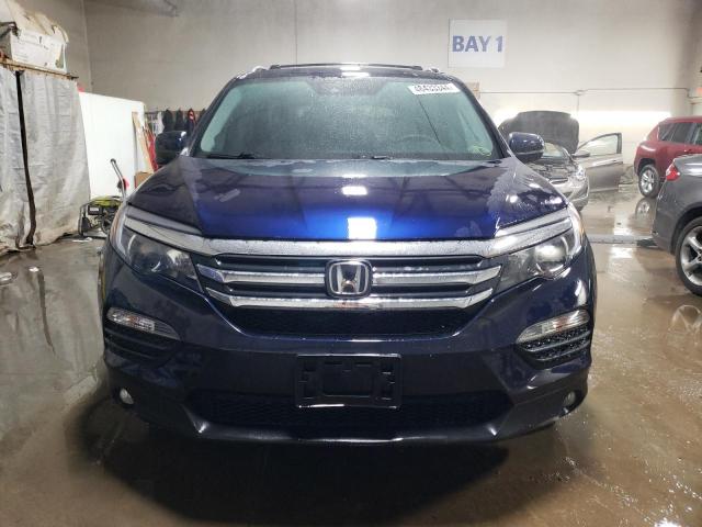 Photo 5 from auction – 2016 HONDA PILOT EX with VIN 5FNYF6H42GB126870