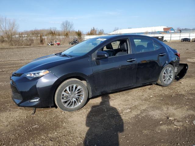 TOYOTA COROLLA L 2017 with VIN 2T1BURHE0HC859379 - Photo from auction