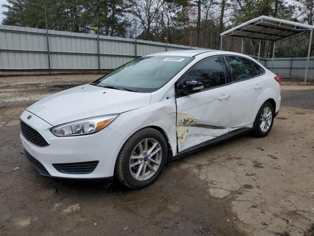 FORD FOCUS SE 2017 with VIN 1FADP3F23HL212432 - Photo from auction