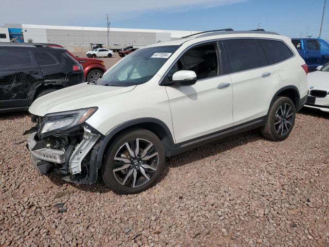 HONDA PILOT ELIT 2019 with VIN 5FNYF6H03KB061369 - Photo from auction
