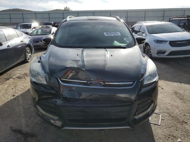 Photo 5 from auction – 2014 FORD ESCAPE TIT with VIN 1FMCU9J9XEUE13753