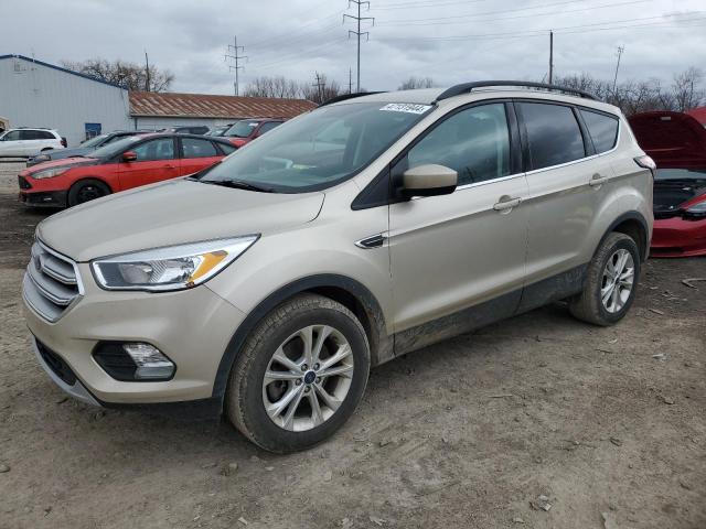 FORD ESCAPE SE 2018 with VIN 1FMCU9GD3JUD17310 - Photo from auction