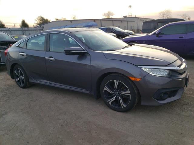 Photo 4 from auction – 2017 HONDA CIVIC TOUR with VIN 2HGFC1F97HH655262