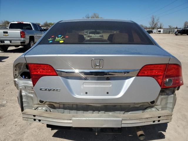 Photo 6 from auction – 2010 HONDA CIVIC LX with VIN 19XFA1F55AE045315