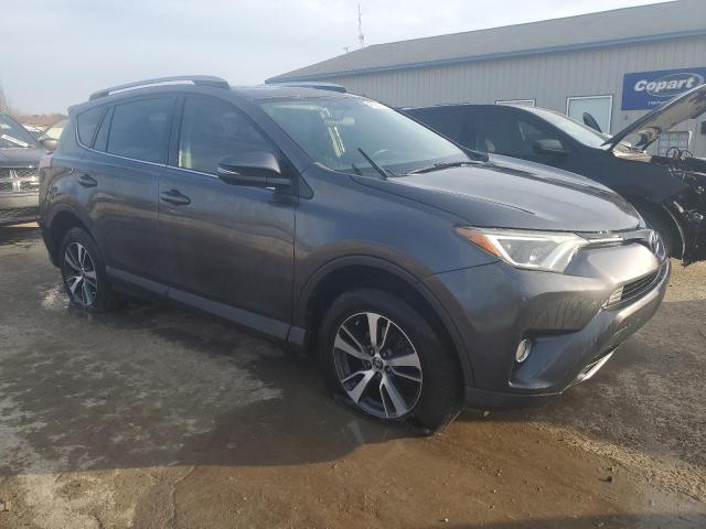 Photo 4 from auction – 2016 TOYOTA RAV4 XLE with VIN JTMWFREV6GJ097050