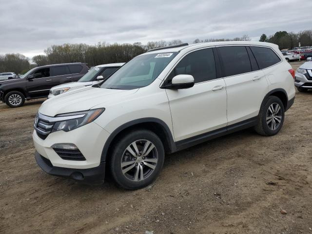 HONDA PILOT 2018 with VIN 5FNYF5H57JB002815 - Photo from auction