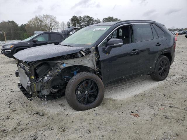 TOYOTA RAV4 SE 2023 with VIN JTM16RFV8PD107150 - Photo from auction