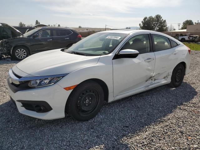 HONDA CIVIC EX 2018 with VIN JHMFC1F3XJX033684 - Photo from auction