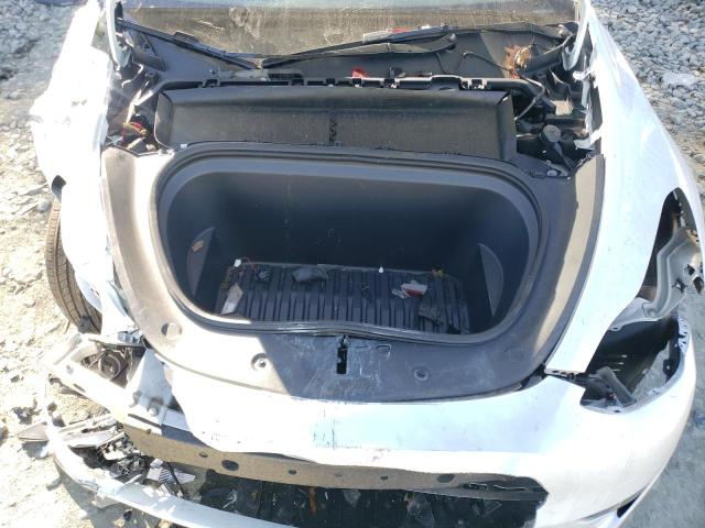 Photo 11 from auction – 2023 TESLA MODEL Y with VIN 7SAYGDEE1PA073707