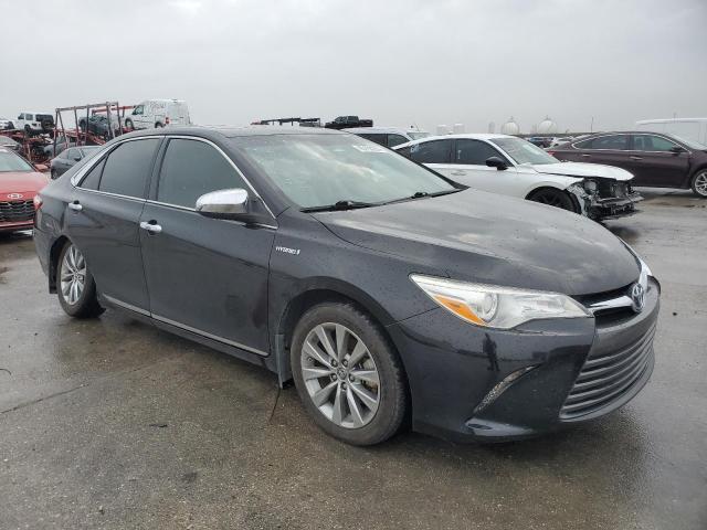 Photo 4 from auction – 2015 TOYOTA CAMRY HYBR with VIN 4T1BD1FK3FU146935