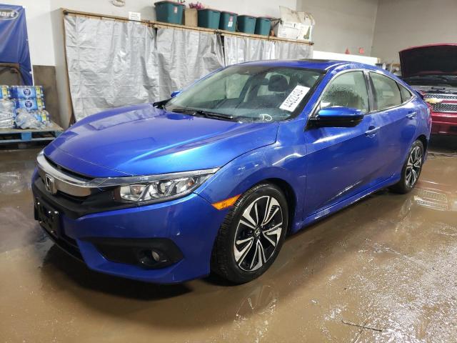 HONDA CIVIC EX 2018 with VIN JHMFC1F41JX000114 - Photo from auction