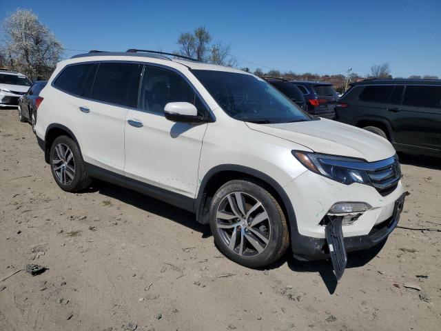 Photo 4 from auction – 2016 HONDA PILOT ELIT with VIN 5FNYF6H04GB065292