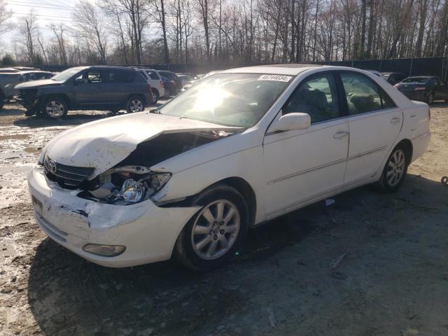 TOYOTA CAMRY LE 2003 with VIN 4T1BF30K13U052921 - Photo from auction