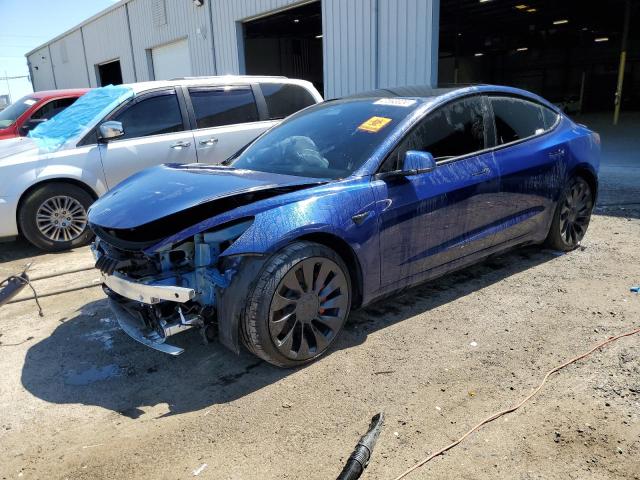 TESLA MODEL 3 2022 with VIN 5YJ3E1EC6NF317751 - Photo from auction