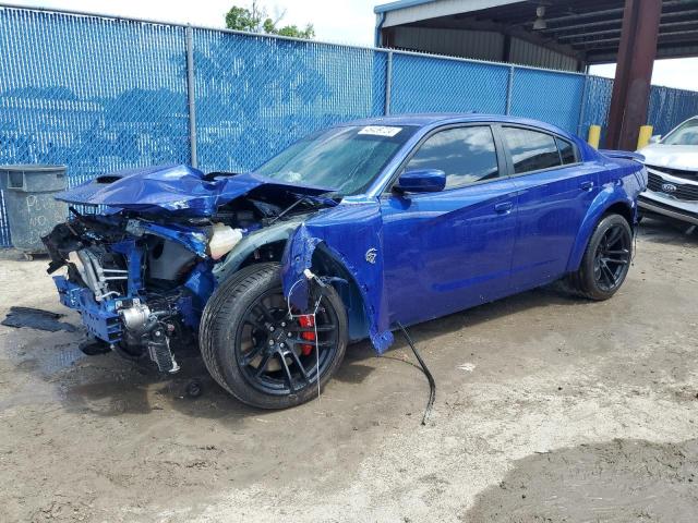 DODGE CHARGER SR 2022 with VIN 2C3CDXL9XNH102627 - Photo from auction