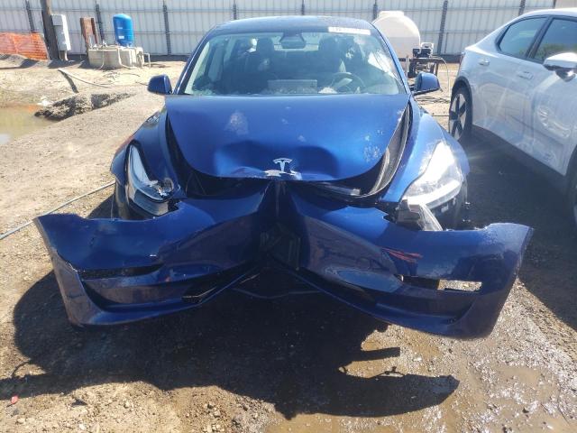 Photo 5 from auction – 2022 TESLA MODEL 3 with VIN 5YJ3E1EB7NF144202