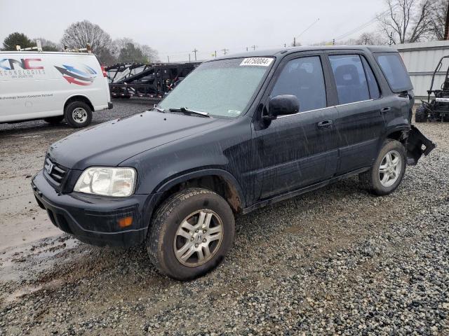 HONDA CR-V EX 2000 with VIN JHLRD1860YS018673 - Photo from auction