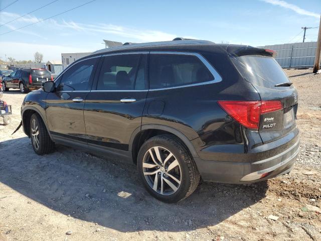 Photo 2 from auction – 2017 HONDA PILOT TOUR with VIN 5FNYF6H94HB009062