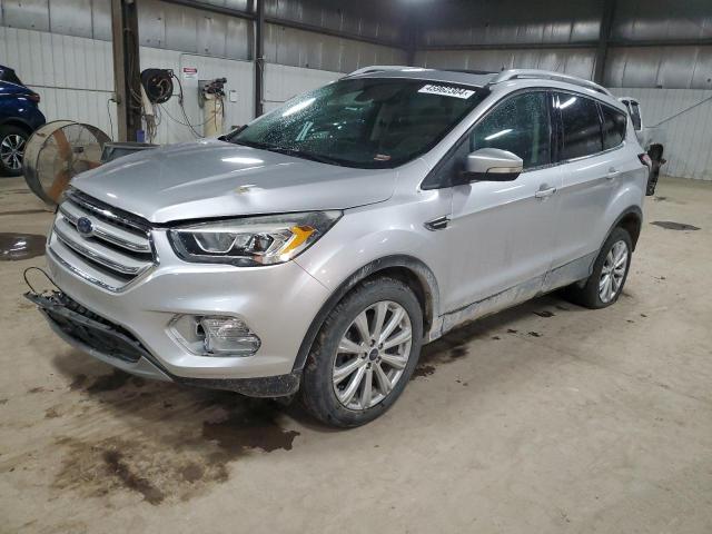 FORD ESCAPE TIT 2017 with VIN 1FMCU9JD1HUC30072 - Photo from auction