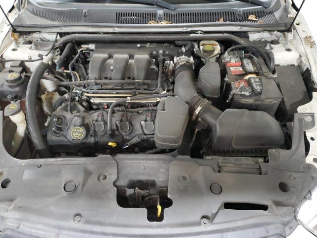 Photo 11 from auction – 2014 FORD TAURUS POL with VIN 1FAHP2MK9EG168116