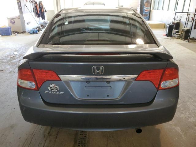 Photo 6 from auction – 2011 HONDA CIVIC LX with VIN 19XFA1F52BE019403