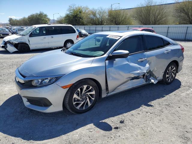 HONDA CIVIC EX 2018 with VIN 19XFC2F79JE012500 - Photo from auction