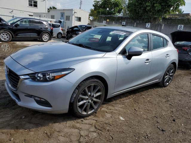 MAZDA 3 TOURING 2018 with VIN 3MZBN1L38JM180684 - Photo from auction